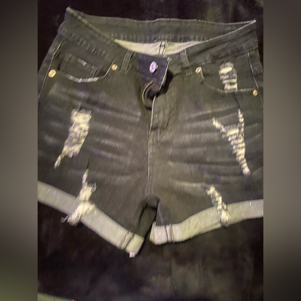 Black shorts size medium. Has stretch.
